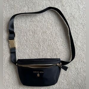 Michael Kors Black and Gold Zip Pouch